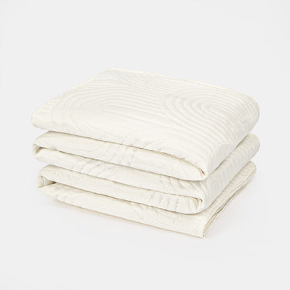 Arches Embossed Pinsonic Throw – Cream