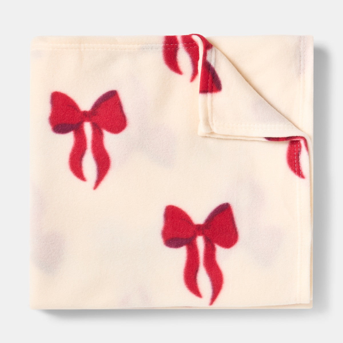 Bow Print Fleece Throw – Cream/Red