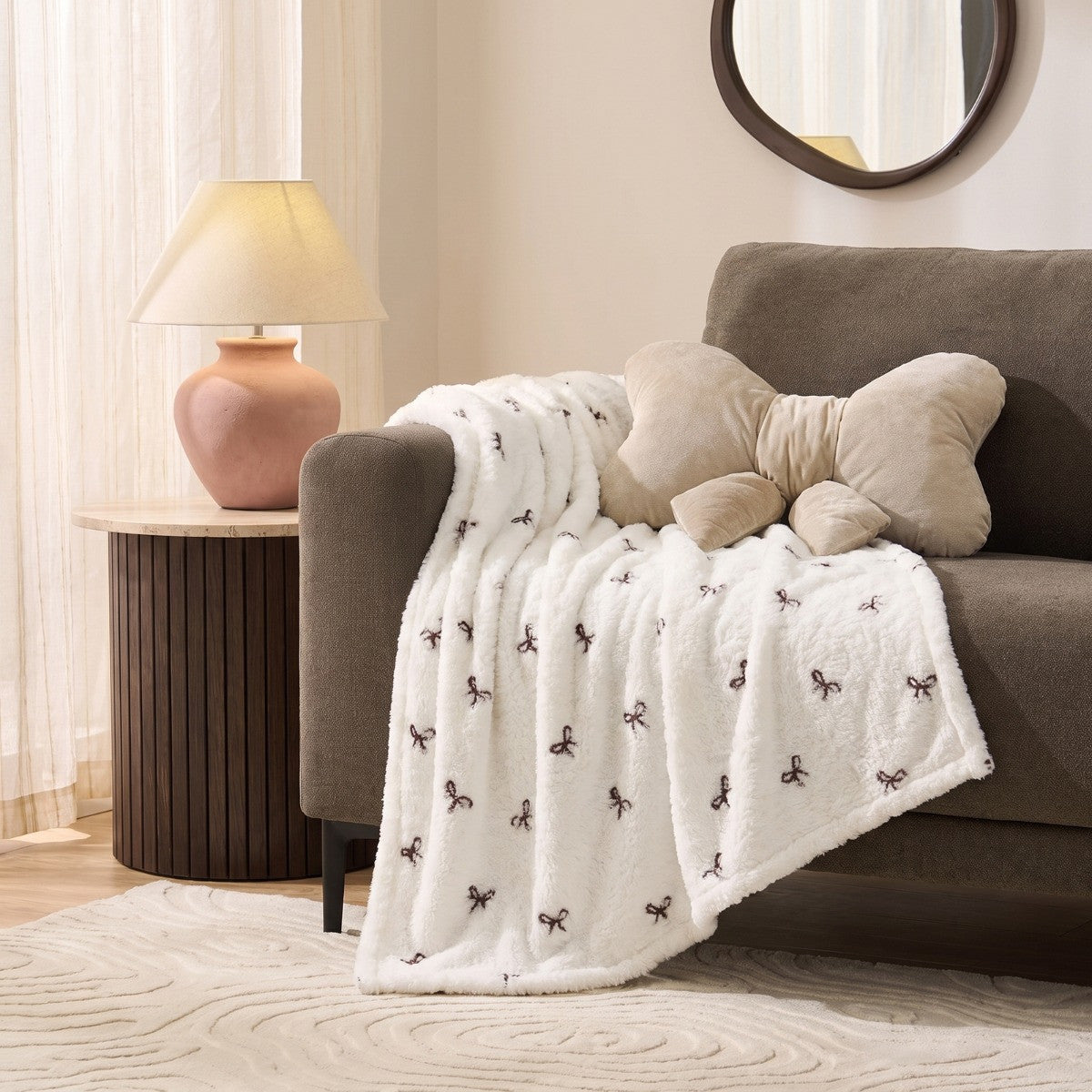 Bow Embossed Fleece Throw – Monochrome