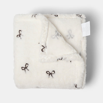Bow Embossed Fleece Throw – Monochrome